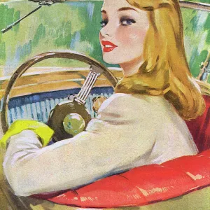 Young woman at the wheel of a car