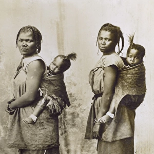 Two Zulu Mothers carrying their children