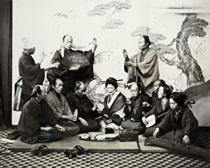 Aoriental Gallery: 1860s Japan - portrait of a group of men and women enjoying a social meal with music