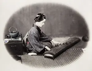 1860s Japan - portrait of a young woman musician playing a koto Felice or Felix Beato