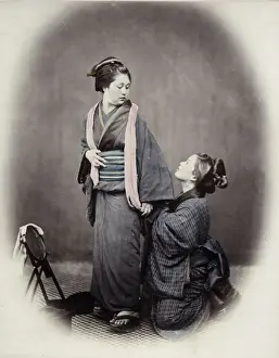 Beato Prints: 1860s Japan - portrait of a young woman tying her obi sash Felice or Felix Beato