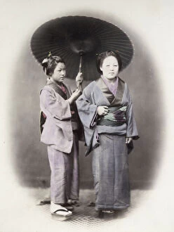 1860s Japan - portrait of two young women and a parasol umbrella Felice or Felix Beato