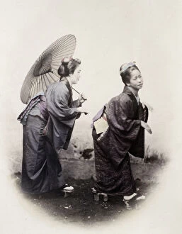 1860s Japan - portrait of a two young women in the pose of the Grecian Bend Felice or