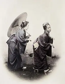 Geisha Prints: 1860s Japan - portrait of a two young women in the pose of the Grecian Bend Felice or