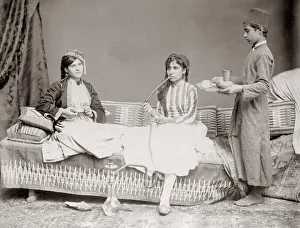 1880s - young Egyptian women being served coffee
