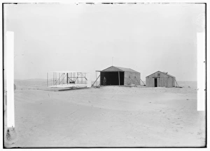 1903 machine and large camp building where it was housed, an 1903 machine and large camp building where it was housed, an