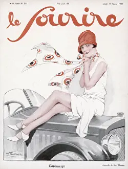 1920s women sitting on the bonnet of a car