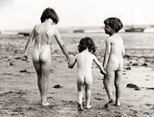 Hands Prints: 1930s press print - children on beach hand in hand
