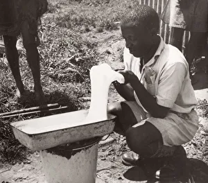 1940s East Africa Uganda - tapping rubber trees