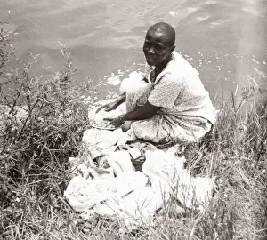 1940s East Africa - Uganda washing clothes Lake Victoria