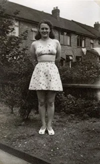 Racy Gallery: 1940s - Lay poses in back garden in new beachwear