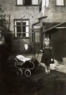 Pram Prints: 1940s - Young girl with her toy pram