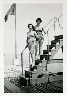 Swimsuits Prints: 1950s Bathing Lovelies posing on a set of steps