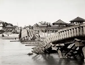 19th century vintage photograph: earthquake damage in Japan c. 1890, collapsed bridge