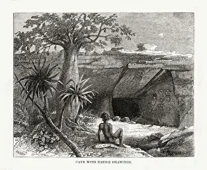 Aboriginal Prints: An aboriginal outside the entrance to a cave which is ornamented with religious artworks Date: circa 1860