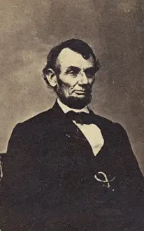 Parted Prints: Abraham Lincoln, three-quarter length portrait, seated, faci
