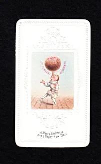 Accounts Collection: Acrobat balancing pudding on nose on a Christmas card
