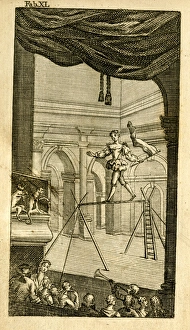 Images Dated 23rd December 2016: Acrobat walking a tightrope on a stage