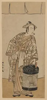 Ichikawa Prints: The actor Ichikawa Monnosuke II holding a box lantern