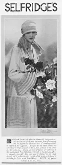 Advert for an elegant coat on sale at Selfridge s, London