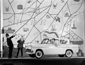 Advertisement for Ford Anglia cars