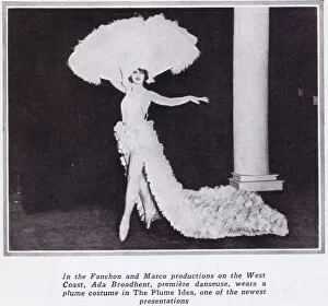 Ada Broadbent wearing an exotic plumed and feathered