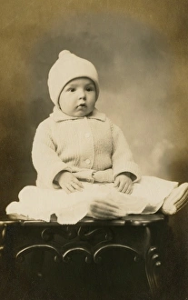 Adorable Gallery: Adorable baby in woollen hat and cardigan