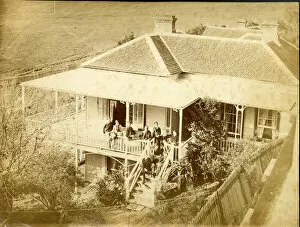 Images Dated 28th July 2016: Aerial photograph of house with group of people