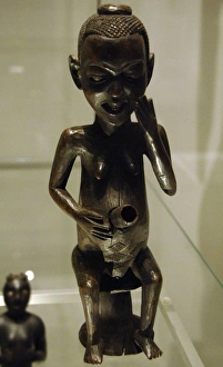 Images Dated 4th April 2008: Africa. Pipe in the form of a seated female figure. Made of