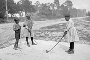 African American Gallery: African-American children playing golf in America