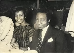 Consulate Collection: African couple, smiling at the camera at a dinner at the Con