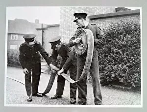 Images Dated 13th December 2011: AFS volunteers undergoing hose drill, WW2