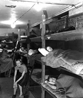Images Dated 28th November 2011: AFS women resting in bunks, Southwark Fire Station, WW2