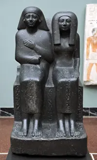 Barefooted Prints: Ahmose and his mother. Egyptian statue