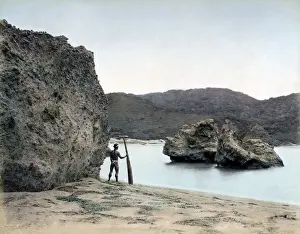 New Images May Prints: Ainu man with a paddle, Hokkaido, Japan, circa 1880s. Date: circa 1880s