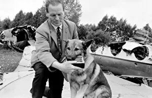 Searching Gallery: Air crash investigator with sniffer dog