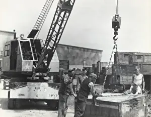 Erding Prints: Airmen and German Men with a Crane Preparing to Lift a W?