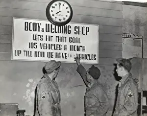 Three Airmen at the Goal Accomplished Sign in the Body?