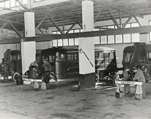 Erding Prints: Airmen Maintaining Buses at the Headquarters of the USAF?