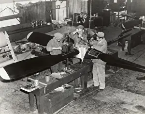 Airmen Working on a Propeller at the Headquarters of the?