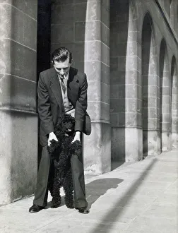 Shirley Prints: Alec Baker with the family pet poodle