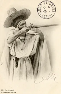 Aims Collection: Algeria - An Insurgent aiming his rifle