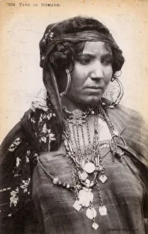Images Dated 14th November 2017: Algeria - A Nomadic Woman with extensive jewellery