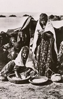 Images Dated 3rd August 2016: Algeria - Nomadic Women performing cooking and textile tasks