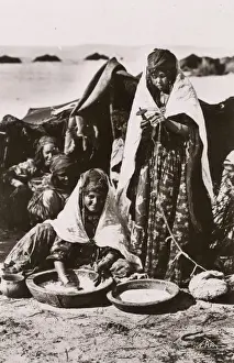 Algeria - Nomadic Women performing cooking and textile tasks