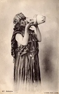 Pitcher Prints: Algerian Bedouin Woman drinking from a small decorated ewer