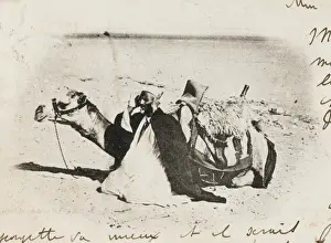 Midday Prints: An Algerian Man prays alongside his camel