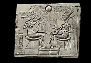 Amenhotep IV with Nefertiti and their children