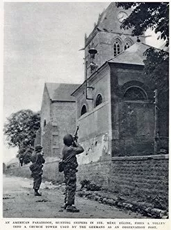 Landings Collection: American paratroop, hunting snipers in St. Mere Eglise, firing a volley into a church