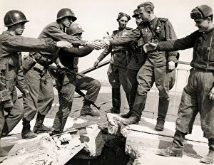 First Gallery: American soldiers shake hands w. Russians River Elbe, 1945 W